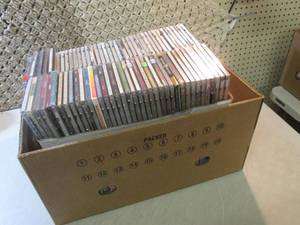 lot 267 image: Box Full of Assorted CDs DVDs Gam...