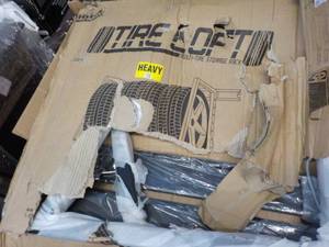 lot 133 image: Metal Tire Loft- Multi tire storage...