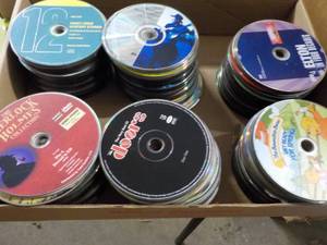 lot 163 image: 300 or more DVDs, CDs and Games...
