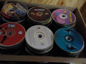 lot 164 image: 300 or more DVDs, CDs and Games...