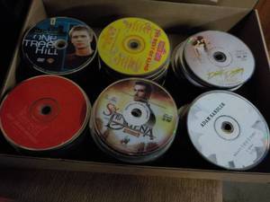 lot 165 image: 300 or more DVDs, CDs and Games...