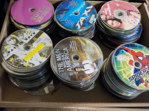 lot 167 image: 300 or more DVDs, CDs and Games...