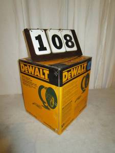 lot 108 image: DeWalt Manual Hose Reel - 50 ft