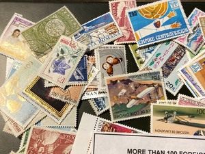 More Than (100) Foreign Mint & Cancelled Stamps