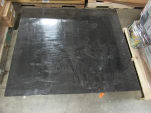 lot 314 image: Black Acrylic 48 12 X 55 12 X 1 - Some Small Scratches.