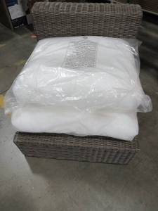 lot 315 image: Home Decorators Collection, WickerResin Armless Patio Chair, Grey, With Cushion Fill.