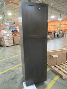 lot 394 image: Hampton Bay Cambridge Assembled 84x24x24.6 in. Pantry Cabinet with adjustable shelves in Dusk - Bottom Damage and scratches.