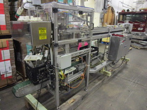 lot 107 image: DEAM WESTFALIA PLASTIC BOTTLE CASER MACHINE
