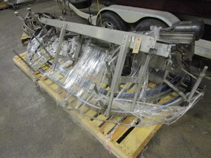 lot 166 image: TWO PALLETS OF STAINLESS STEEL CASE CONVEYOR SECTIONS