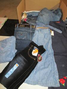 lot 200 image: Size 7-8 Ladies Large Lot of JeansOverallsSkirtsShorts (Box Size21.5 X 17.5 X 14.5)