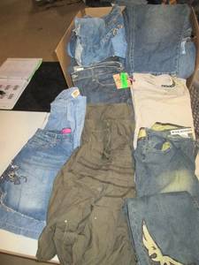 lot 204 image: Size 15-16 Ladies Large Lot of JeansSkirtsShorts (Box Size21.5 X 17.5 X 15)