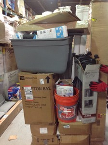 Pallet with big box items from major retailer. They are customer returns. Some of the contents of this pallets are flooring  heater echo lawn mowers shelf and much more
