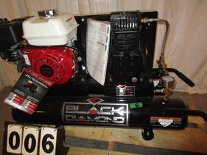lot 6 image: Black Diamond 8 Gallon Air Compressor