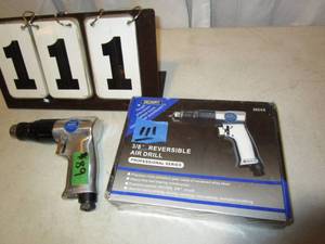 lot 111 image: Mechanics 38 Reversible Air Drill