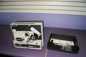 lot 14 image: BELL & HOWELL FILMOSONIC 1744 SUPER 8 VARIABLE SPEED PROJECTOR