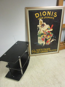 lot 546 image: MULTI-PURPOSE ENTERTAINMENT STAND AND ITALIAN AD ART PRINT