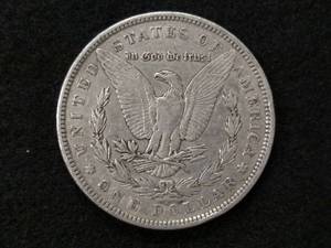 lot 14 image: 1884 Morgan Silver Dollar...