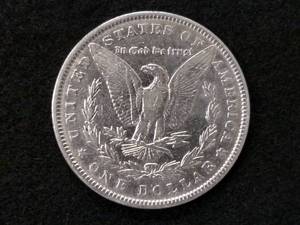lot 16 image: 1886 Morgan Silver Dollar...