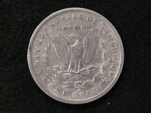 lot 21 image: 1890 O Morgan Silver Dollar...