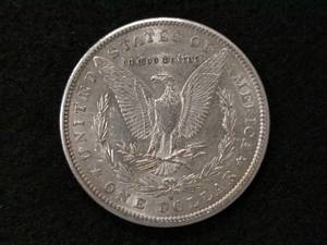 lot 22 image: 1890 S Morgan Silver Dollar...