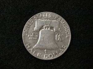 lot 154 image: 1957 D Franklin Silver Half Dollar...