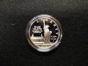 lot 210 image: 1986 Ellis Island Commemorative Sil...