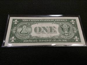 lot 225 image: 1935 E Uncirculated One Dollar Silv...