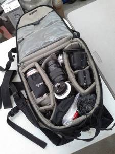 lot 59 image: Sony 7s Camera Bodies,  Sony E-Mount Lens, Canon 70-200mm USM Zoom Lens, Fotga DP3000 Mount, Camera Mounts, Battery Charger, Brush and Screwdriver, Camera Bag, Misc. Carry Bags