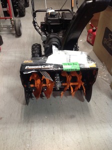 Power Care 24 in. Two-Stage Gas Snow Blower with Electric Start and Headlight in working conditions
