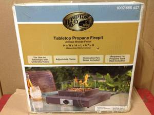 lot 3 image: Hampton Bay 8,000BTU Antique Bronze Portable Table Top Gas Fire Pit not used