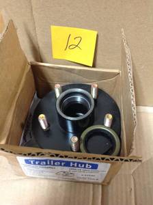 lot 12 image: Martin Wheel 5-Bolt Trailer Hub Repair Kit for 1-38 in. x 1-116 in. Axle in very good condition