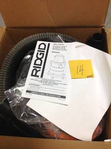 lot 14 image: RIDGID 6 Gal. 4.25-Peak HP Stainless Steel Wet Dry Vac in good condition