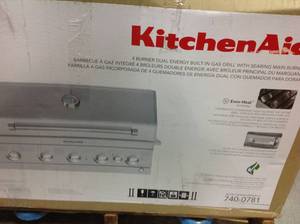 lot 25 image: KitchenAid 4-Burner Built-in Propane Gas Island Grill Head in Stainless Steel with Searing Main Burner and Rotisserie Burner not used