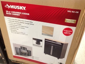 lot 134 image: Husky 33 in. H x 28 in. W x 18 in. D 1-Drawer 2-Door Steel Garage Base Cabinet not used