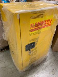 lot 138 image: Edsal  35 in. H x 23 in. W x 18 in. D Steel Freestanding Flammable Liquid Safety Single-Door Storage Cabinet in Yellow  not used whit damage on the side