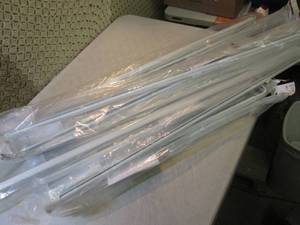lot 107 image: 15 Assorted Adjustable Curtain Rods...