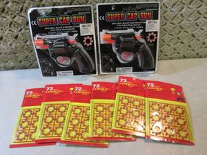 lot 131 image: 2 Super Cap Guns with 6 Packs of 8-...