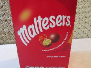 lot 148 image: Box of 18 Bags of Maltesers Candy B...