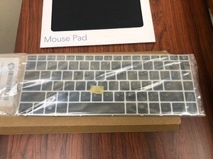 lot 15 image: HP SPS KEYBOARD BACKLIT, NEW MOUSEPAD MSRP $125
