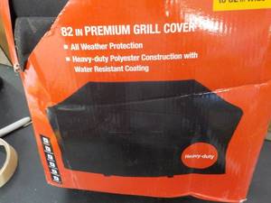 lot 19 image: 82 Universal Premium Grill Cover...