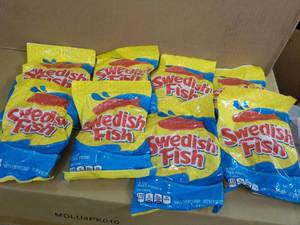 lot 73 image: 8-8 oz Swedish Fish best date July...