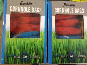 lot 99 image: Set of 2 Franklin Corn hole Bags 8...