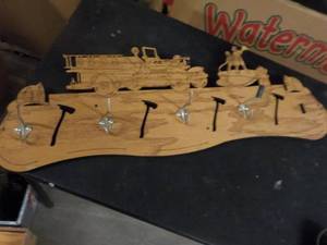 lot 211 image: Fireman Coat Rack...
