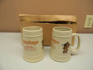 lot 27 image: CAPTAIN MORGAN SPICED RUM CERAMIC MUGS - (SET OF 6 IN BOX) - SEE PICTURES