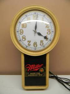 lot 33 image: MILLER CLOCK - CLOCK WORKS NEEDS A BULB - SEE PICTURES