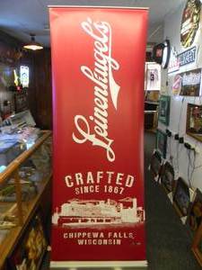 lot 34 image: LEINENKUGELS BEER - Retractable display banner stand  easy to set up and take down OR CAN BE HUNG - LARGE VERY COOL APPROX 30 X 80 - SEE PICTURES