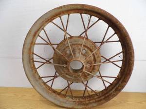 lot 21 image: Antique Ford Rim