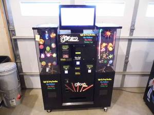 lot 84 image: Glow Machine Vending Machine