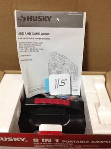 lot 115 image: Husky 1002242078 8 In 1 Portable Jump Startin good condition