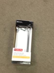 lot 32 image: Delta Nora Toilet Paper Holder in Chrome and Glass new